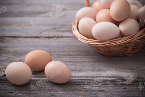 Preview: Eggs On Wooden Background