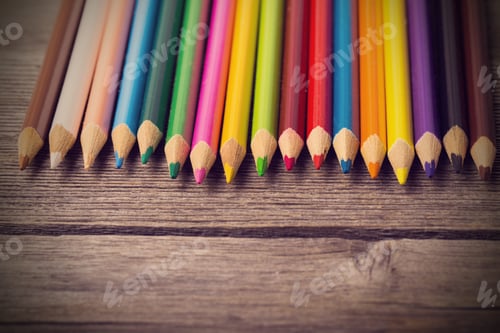 Preview: Multicolored Pencils On The Wooden Background