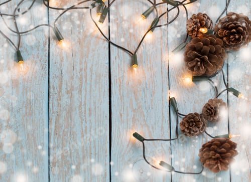 Preview: Christmas Lights On Blue Wooden Background