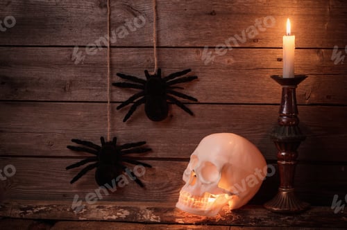 Preview: Skull And Candle On Wooden Background. Halloween