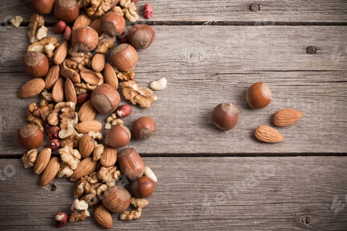 Preview: Mixed Nuts On Old Wooden Background