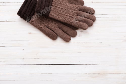 Preview: Gloves On White Wooden Background