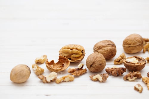 Preview: Walnuts On White Wooden Background