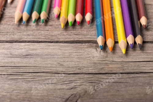 Preview: Multicolored Pencils On The Wooden Background
