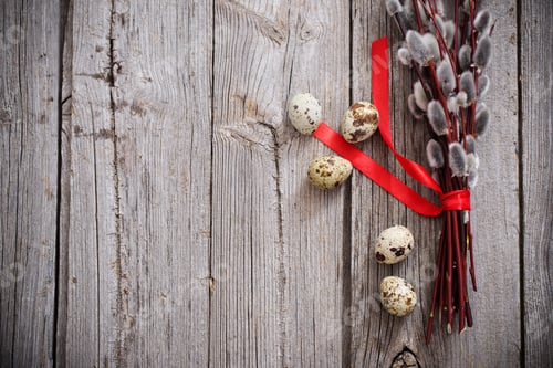Preview: Branches Of Willow With Eggs On A Wooden Background