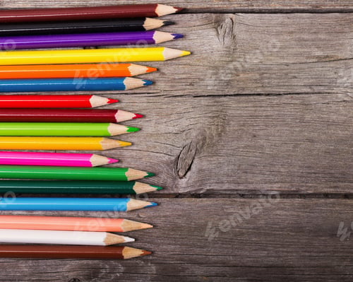 Preview: Multicolored Pencils On The Wooden Background