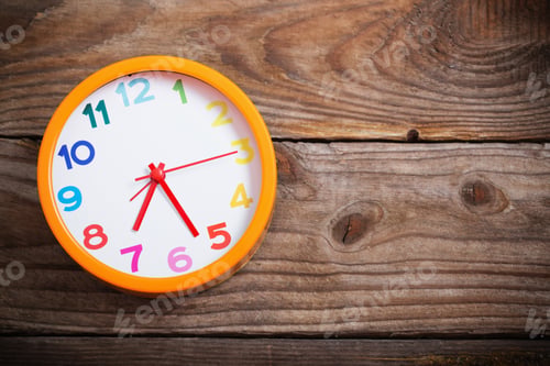 Preview: Modern Alarm Clock With Colorful Number On Wooden Background