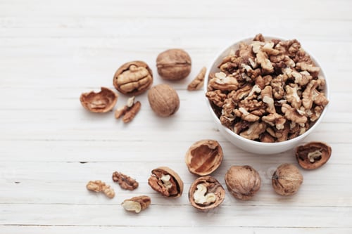 Preview: Walnuts On White Wooden Background