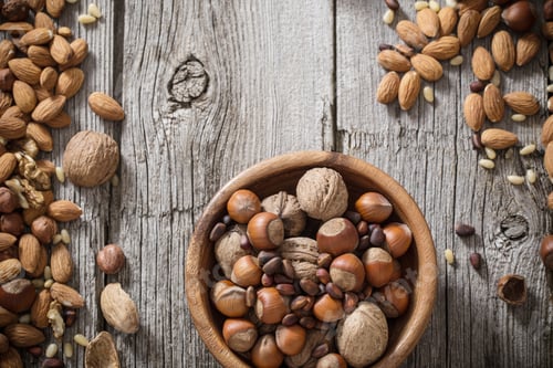 Preview: Mixed Nuts On Old Wooden Background