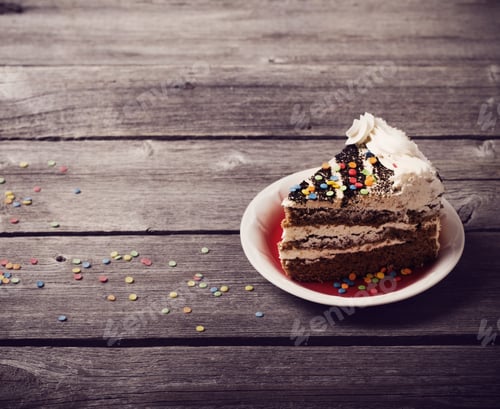 Preview: Piece Of Cake On The Wooden Table