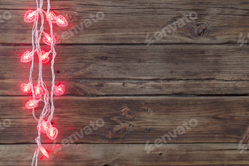 Preview: Red Heart-Shaped Garland On Old Dark Wooden Background