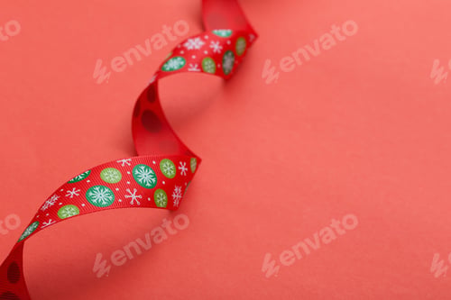 Preview: Christmas Ribbon On Red Paper Background