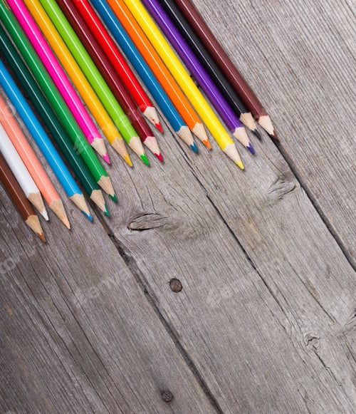Preview: Multicolored Pencils On The Wooden Background
