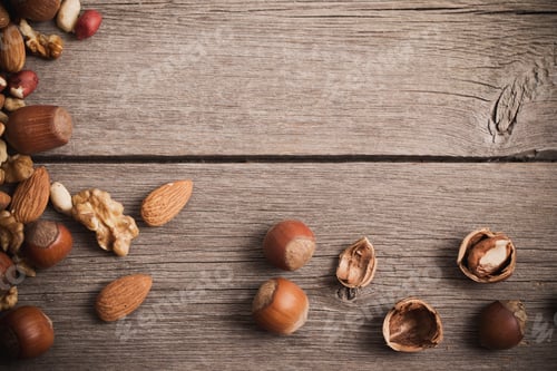 Preview: Mixed Nuts On Old Wooden Background