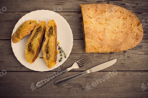 Preview: Meat Pie On A Wooden Table