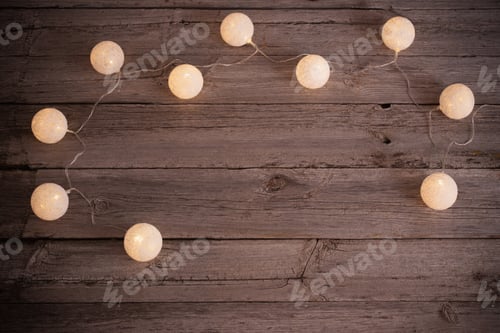 Preview: Christmas Lights On Wooden Background