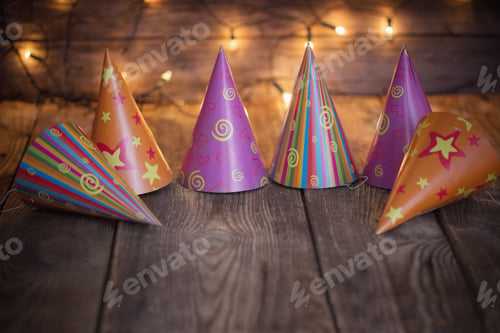 Preview: Party Hats On Old Wooden Background