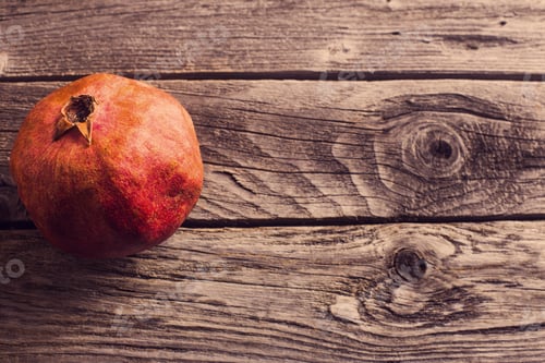 Preview: Pomegranate On Wooden Table