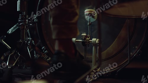 Preview: Rear View Of Man Leg Pressing Pedal Of Bass Drum In Sound Recording Studio. Unrecognizable Musician