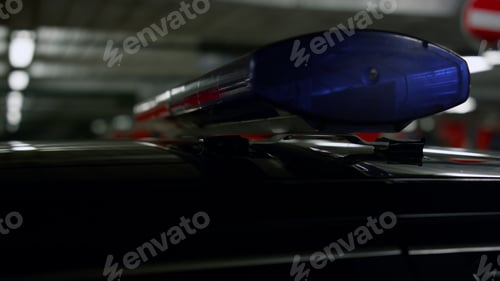 Preview: Red And Blue Lights Glowing On Police Car. Closeup Police Siren Lighting On Roof Of Patrol Vehicle