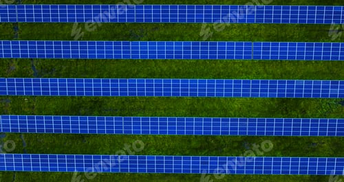 Preview: Top View Blue Solar Panels Rows On Green Grass. Solar Batteries Farm. Sustainable Energy Station