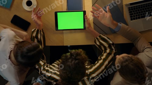Preview: Top View Creative People Looking Green Screen Tablet In Office. Business Woman Demonstrating