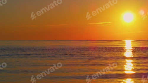 Preview: Panoramic Seascape View At Sunset Evening. Orange Sun Light Path Reflection At Calm Ocean Water