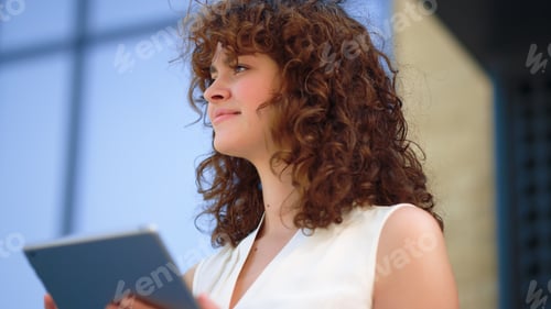 Preview: Portrait Of Business Woman Using Tablet Computer Outdoors. Closeup Young Woman Greetings Someone