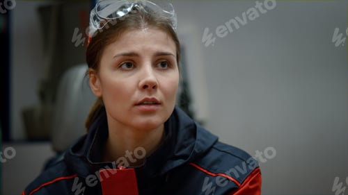 Preview: Focused Medical Worker Listening To Colleague During Conversation. Emergency Medical Doctor Waving