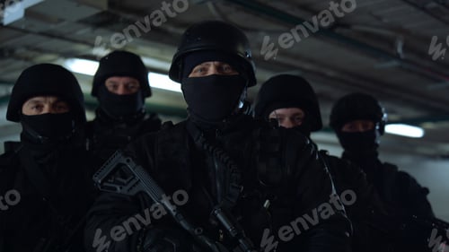 Preview: Portrait Of Masked Swat Police Officers Posing At Camera. Police Special Forces In Helmets Holding