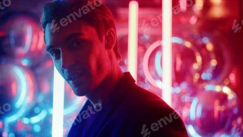 Preview: Closeup Attractive Man Sending Air Kiss In Nightclub. Portrait Of Affectionate Person Flirting On