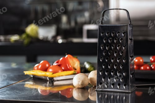 Preview: Fresh Vegetables At Kitchen Restaurant. Closeup Vegetables And Grater At Professional Kitchen