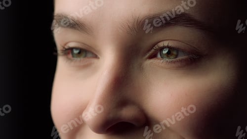 Preview: Portrait Of Happy Female Face Smiling In Black Background. Cheerful Girl Smiling In Studio