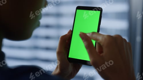Preview: Green Screen Mobile Phone In Business Woman Hands. Closeup Of Smartphone Chroma Key. Close Up