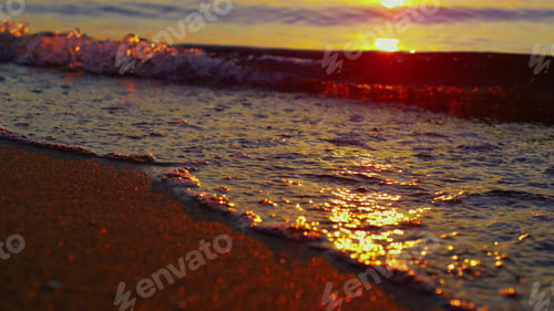 Preview: Close Up Sea Waves Splashing Summer Golden Beach. Closeup Ocean Water Surface Reflecting Orange