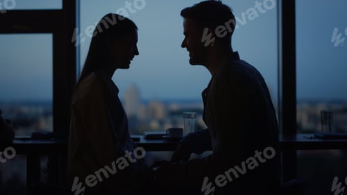 Preview: Silhouettes Of Romantic Couple Touching Hands In Office At Evening. Love Couple Hugging At Dating