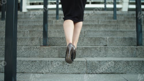 Preview: Close Up Unrecognized Woman Legs Going Upstairs At Street. Female Feet Walking In High Heel Shoes