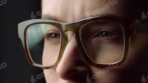 Preview: Portrait Of Shocked Young Woman Squinting Eyes And Eyebrows In Glasses. Shock Student Girl Watching