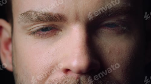 Preview: Macro Portrait Of Young Caucasian Man Opening His Closed Eyes. Male Beautiful Blue Eyes Looking At
