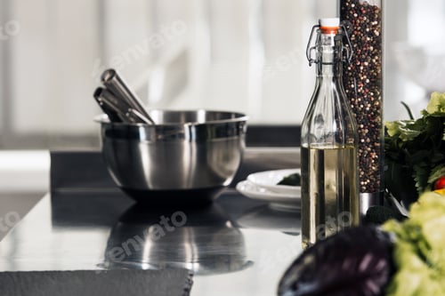 Preview: Condiment Tools On Kitchen Table. Vinegar, Pepper And Bowl On Restaurant Table. Steel Bowl With