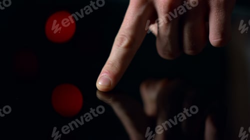 Preview: Macro Video Of Man Finger Touching Black Surface. Accurate Male Finger Pressing Glossy Table