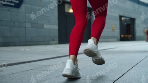 Preview: Close Up Female Legs Jogging On Urban Street. Athlete Woman Legs Running Outdoor. Closeup Fit Girl