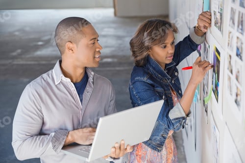 Preview: Business People With Laptop Brainstorming In New Office