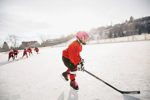 Preview: Girl Playing Ice Hockey On Rink