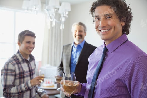 Preview: Portrait Of Man Holding Wineglass At Party