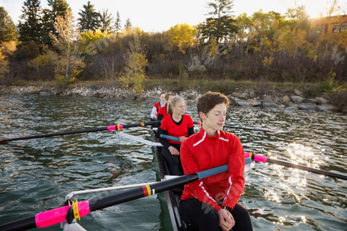 Preview: Rowing Team Resting In Scull On River