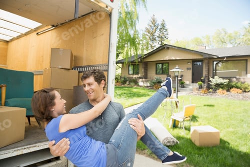 Preview: Man Carrying Woman Outside Moving Van