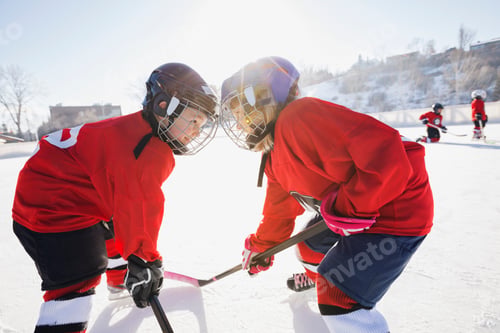 Preview: Hockey Players Facing Off On Ice Rink