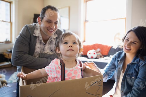 Preview: Baby Girl Playing Inside Of Cardboard Box