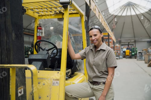 Preview: Portrait Of Confident Worker Leaning On Forklift